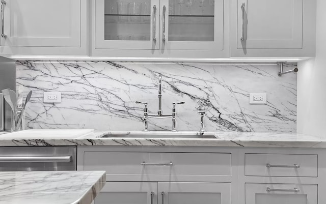 16 E 94th St, New York City, NY 10128 - interior space featuring decorative backsplash, a sink, and dishwasher