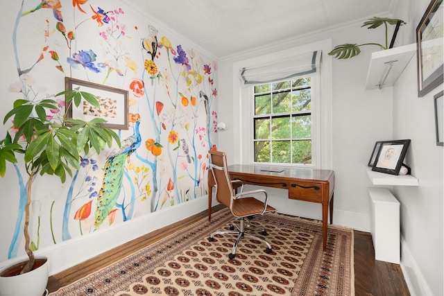 office area featuring baseboards, crown molding, and wood finished floors
