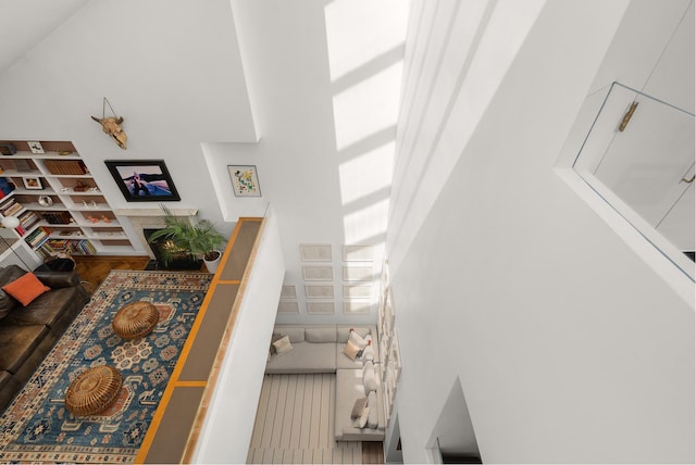 stairway featuring a high ceiling