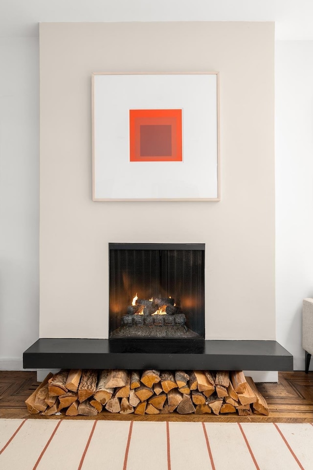 room details with a lit fireplace
