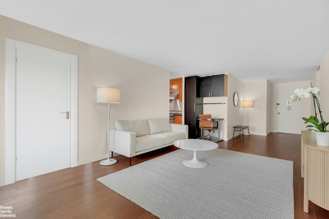 bedroom with wood-type flooring