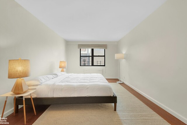 bedroom with light hardwood / wood-style flooring