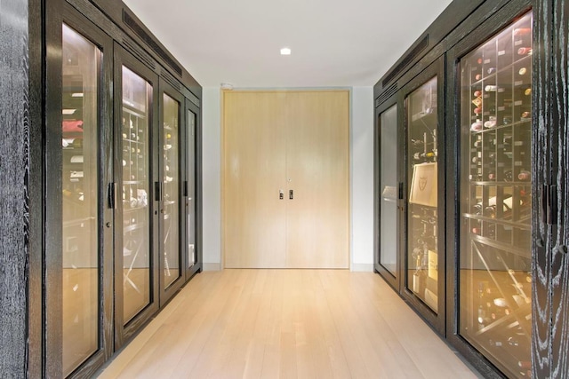 entryway featuring light hardwood / wood-style floors and french doors