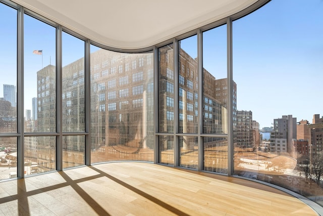 sunroom / solarium with a view of city
