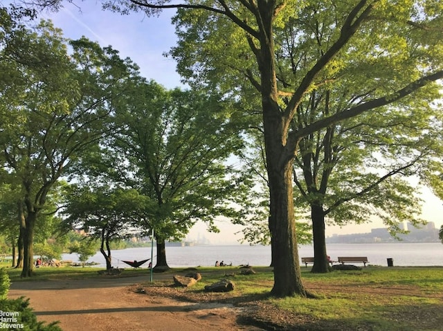 surrounding community with a water view