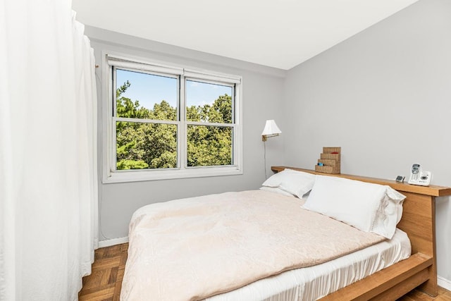 bedroom with parquet floors