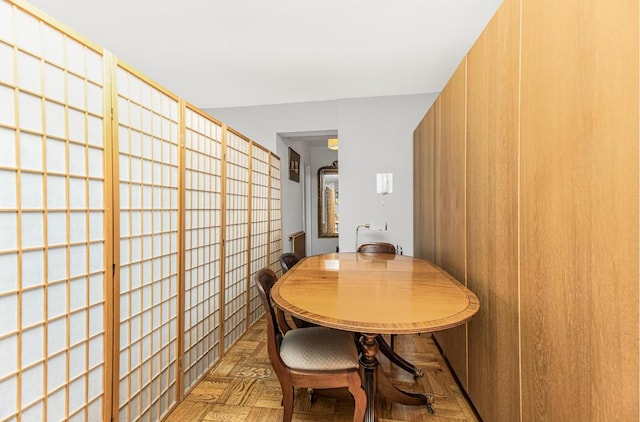 dining area with light parquet floors