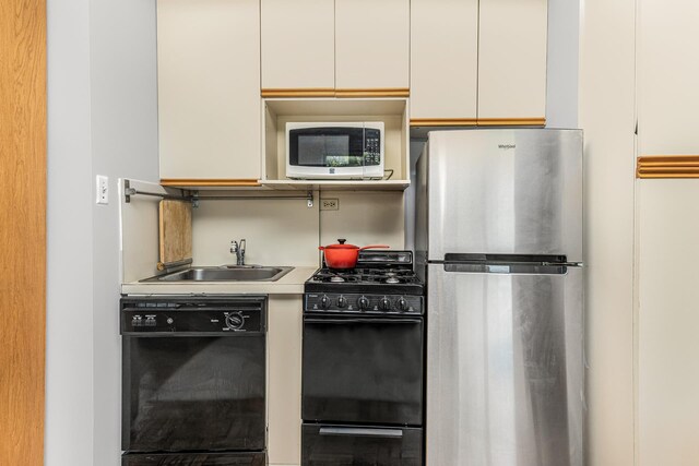 laundry room featuring separate washer and dryer and stacked washer / dryer