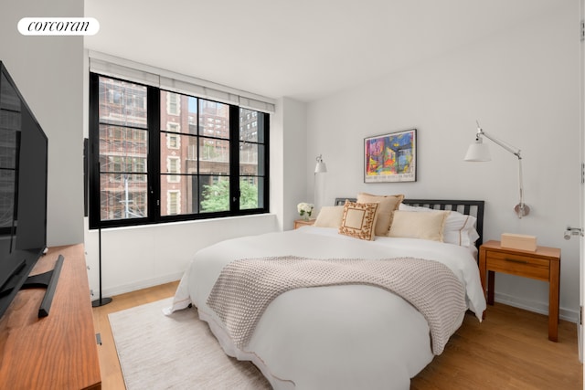 bedroom featuring light hardwood / wood-style flooring