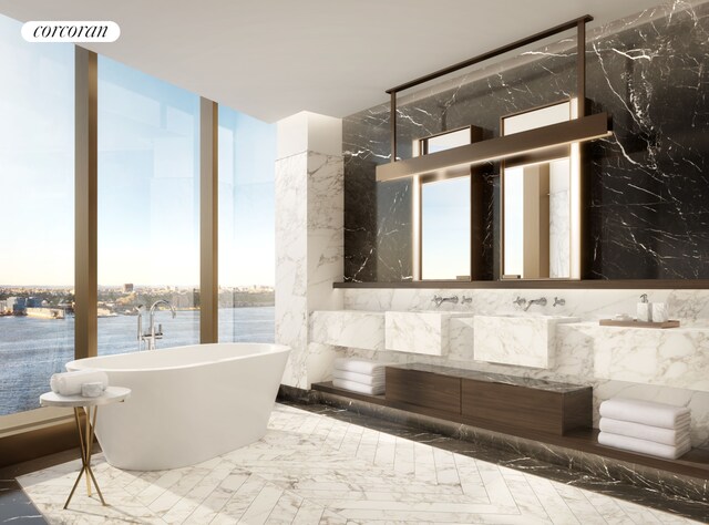 500 W 18th St Unit East22D, New York City, NY 10011 - full bathroom with a freestanding bath, tile walls, and vanity