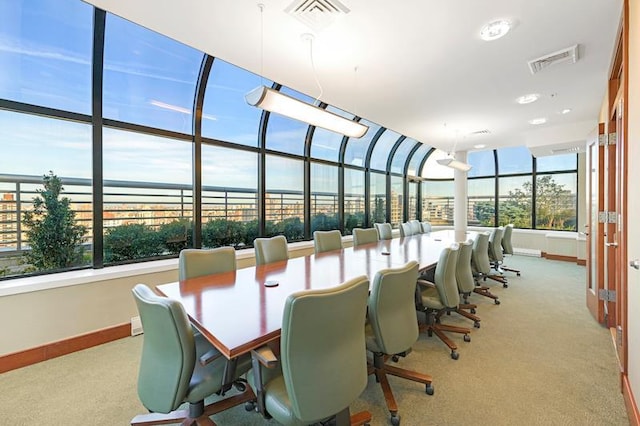 dining area featuring visible vents, baseboards, and carpet