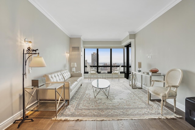 living room with a view of city, wood finished floors, baseboards, and ornamental molding