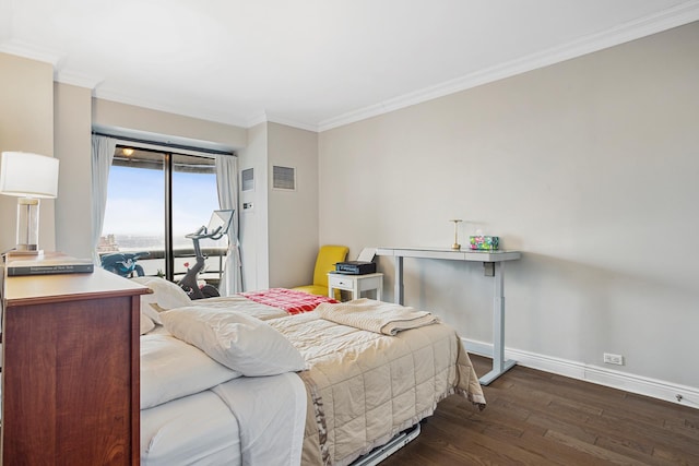 bedroom featuring baseboards, visible vents, dark wood-style flooring, and ornamental molding