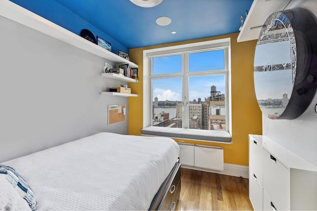 bedroom featuring hardwood / wood-style flooring