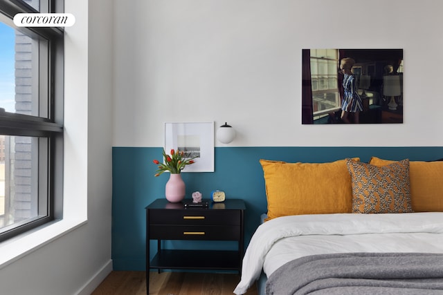 bedroom featuring dark hardwood / wood-style flooring