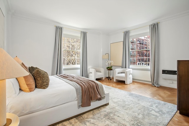 bedroom with ornamental molding