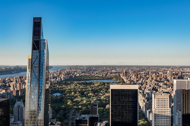 property's view of city featuring a water view