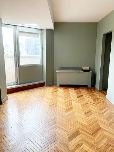 unfurnished room featuring light parquet flooring