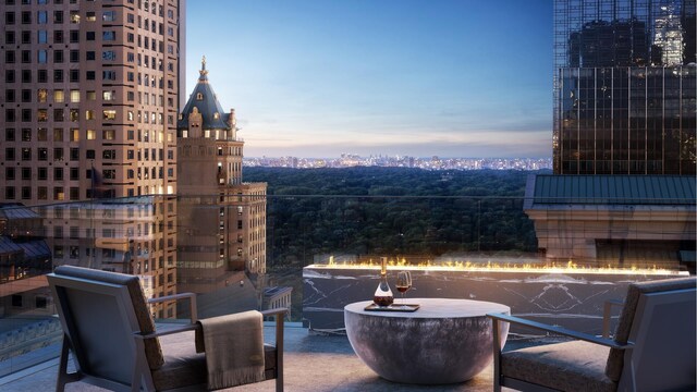 view of patio terrace at dusk