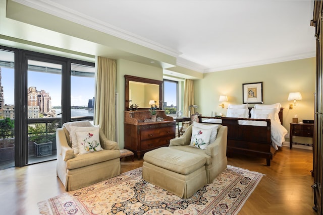 bedroom with access to exterior, a view of city, and ornamental molding