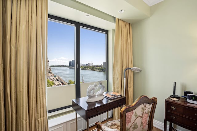 living area with a water view