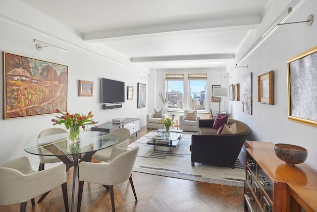 dining space featuring beam ceiling and parquet flooring