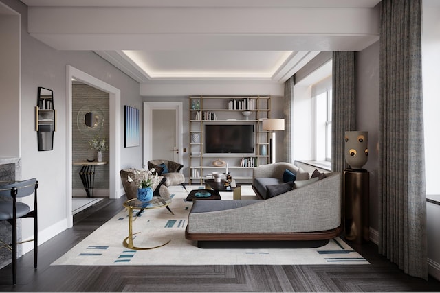 living room featuring a tray ceiling, baseboards, and wood finished floors