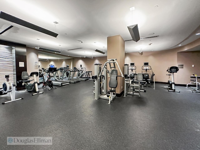 exercise room with baseboards