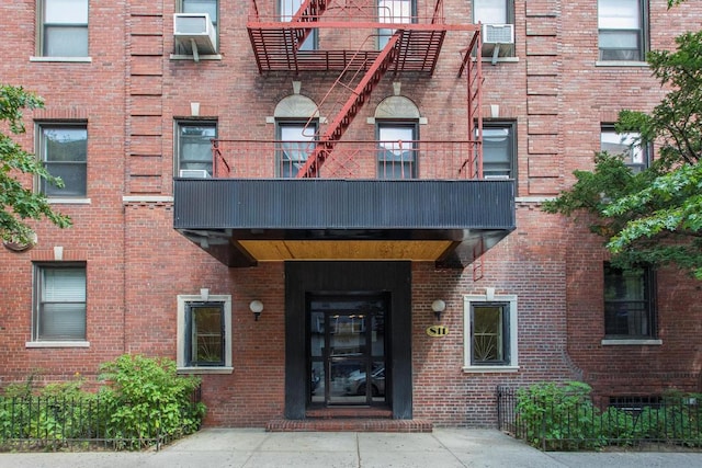 doorway to property featuring a balcony