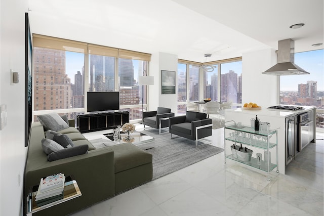 247 W 46th St Unit 1803, New York City, NY 10036 - living room featuring light marble finish flooring