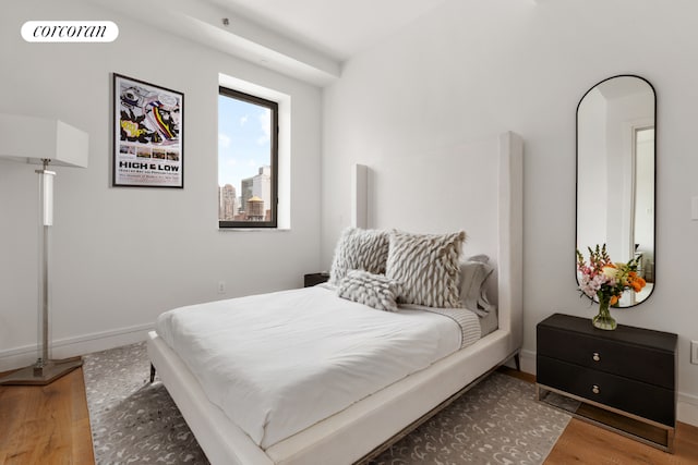 bedroom featuring hardwood / wood-style floors