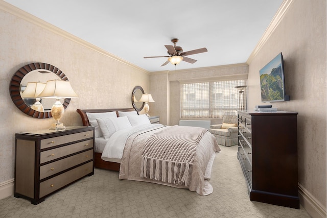 240 E 47th St Unit 33C, New York City, NY 10017 - bedroom with light colored carpet, crown molding, and ceiling fan