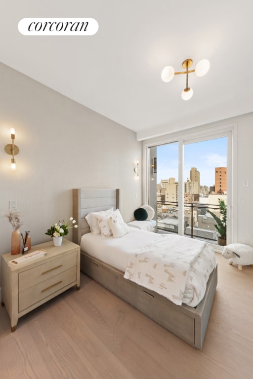 bedroom with light hardwood / wood-style floors