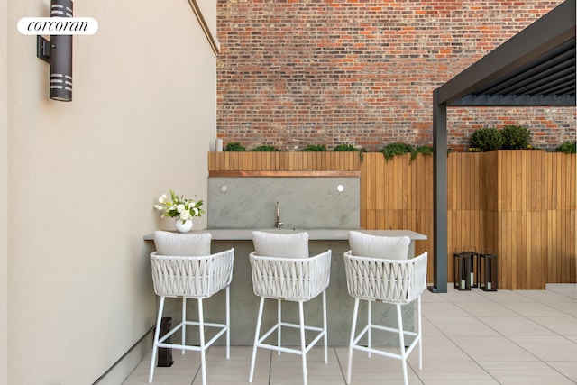 view of patio / terrace with exterior bar