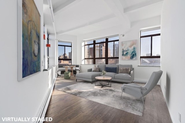 2 Cornelia St Unit 702, New York City, NY 10014 - living room featuring wood finished floors, a baseboard heating unit, beamed ceiling, and baseboards