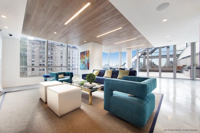 unfurnished sunroom featuring plenty of natural light and a notable chandelier