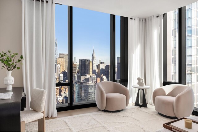 277 5th Ave Unit Ph53, New York City, NY 10016 - sitting room featuring floor to ceiling windows and a skyline view