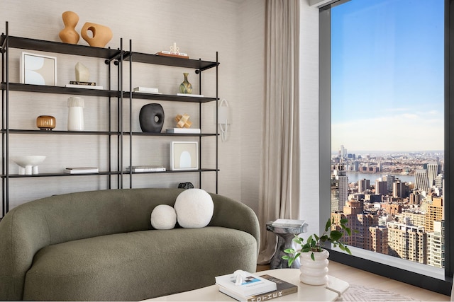 sitting room with a city view and a wealth of natural light