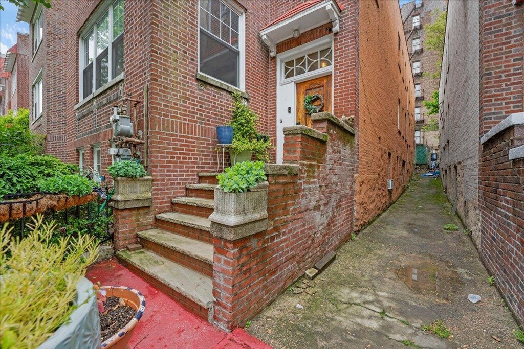 1835 Andrews Ave S, New York City, NY 10453 - entrance to property with brick siding