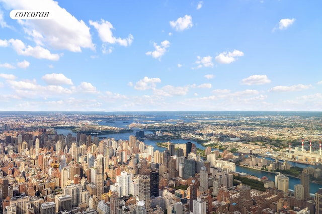 property's view of city with a water view