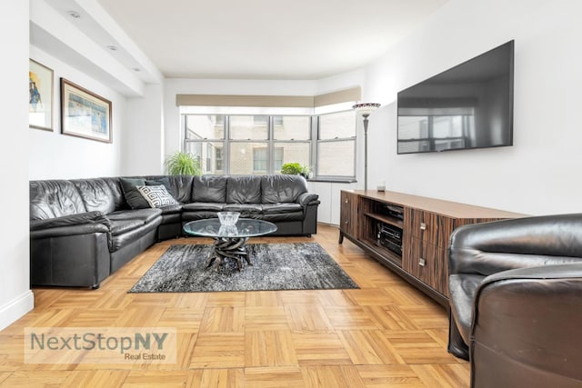 living room featuring light parquet flooring