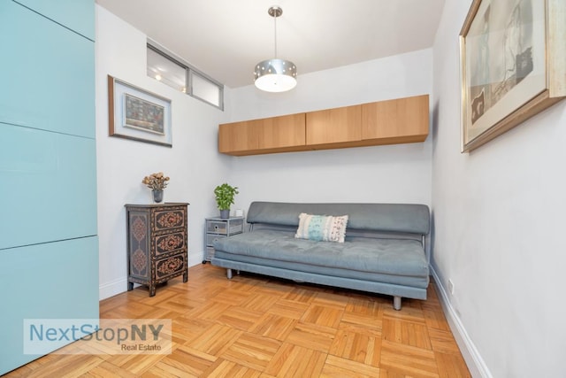 sitting room with light parquet floors