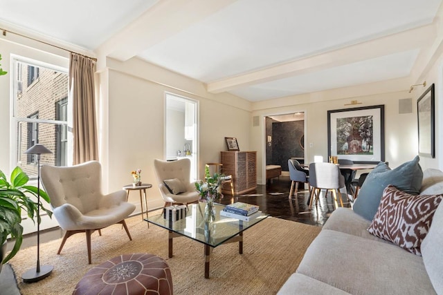 living room with beam ceiling