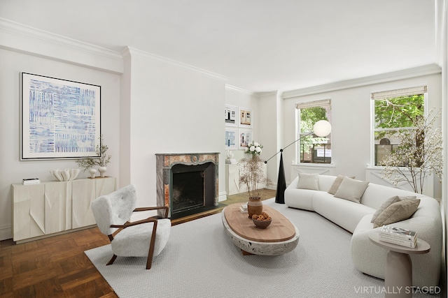 living area with ornamental molding and a high end fireplace