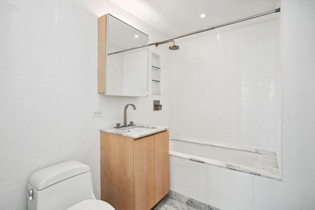 322 W 57th St Unit 55S1, New York City, NY 10019 - bathroom with tiled shower / bath combo, vanity, and tile walls