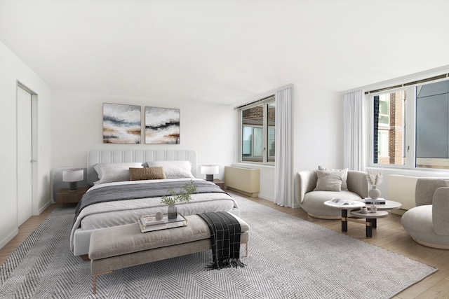 322 W 57th St Unit 55S1, New York City, NY 10019 - bedroom with light wood-type flooring