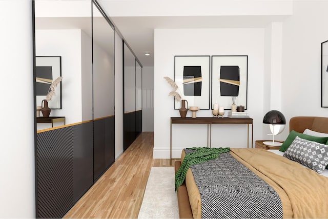 bedroom featuring light wood-type flooring