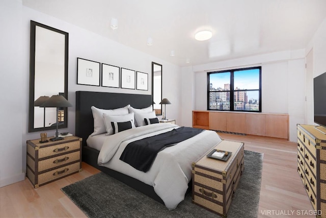 bedroom featuring light hardwood / wood-style flooring