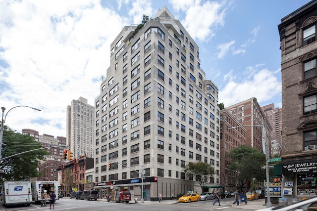 view of building exterior featuring a city view