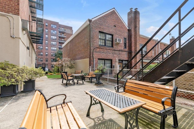 view of home's community featuring a patio area